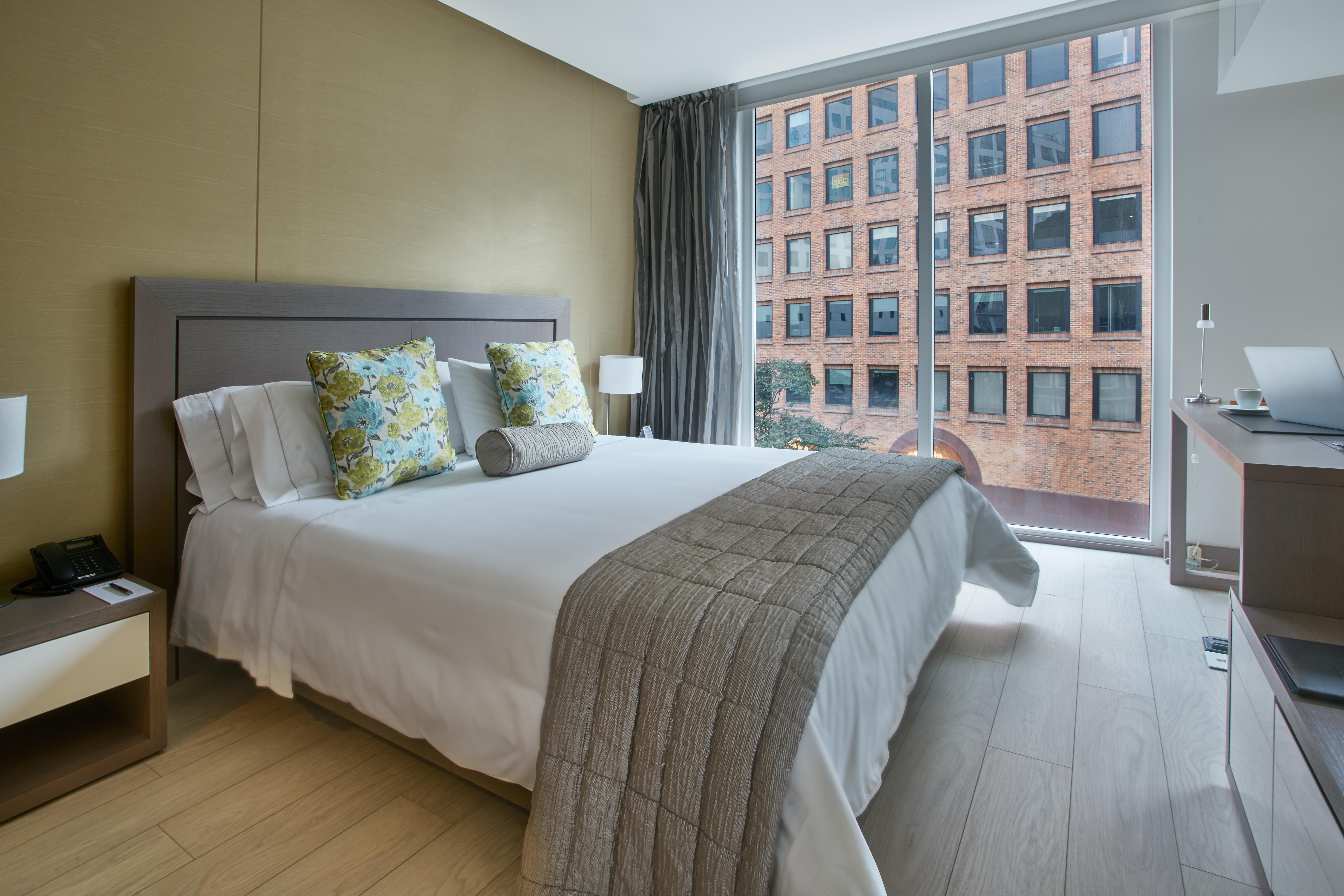 Hotel 100 Luxury Suites By Preferred Bogota Exterior photo A bedroom at the hotel