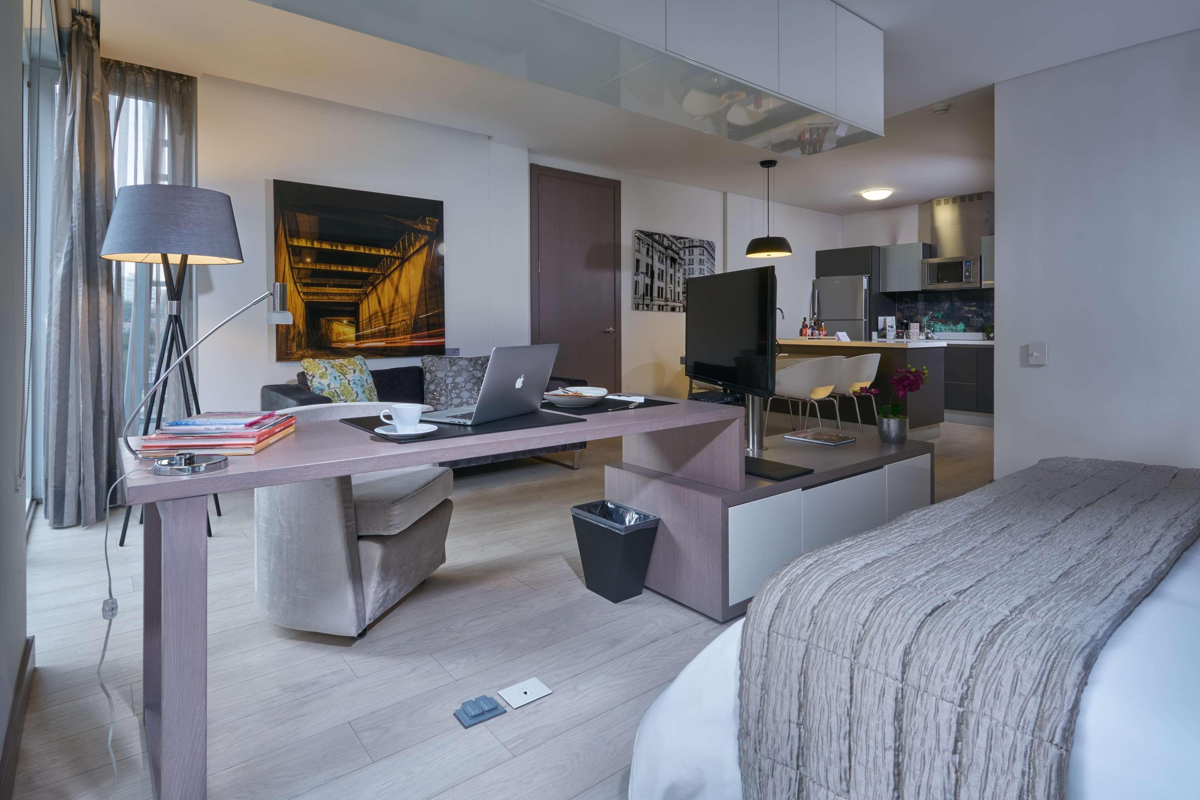 Hotel 100 Luxury Suites By Preferred Bogota Exterior photo A typical studio apartment