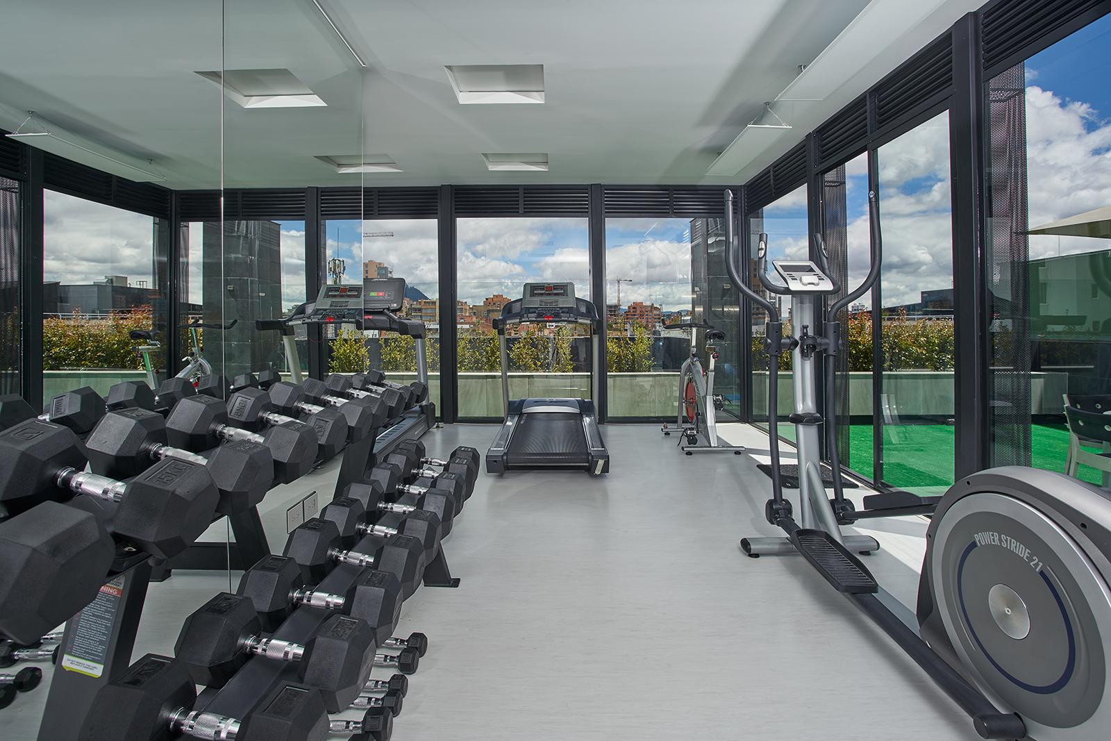Hotel 100 Luxury Suites By Preferred Bogota Exterior photo The gym at the top of the building