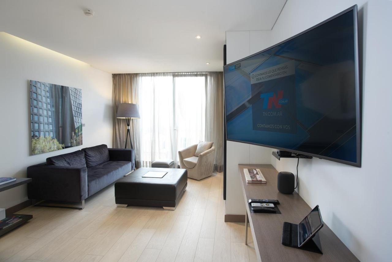 Hotel 100 Luxury Suites By Preferred Bogota Exterior photo A television set in a hotel room
